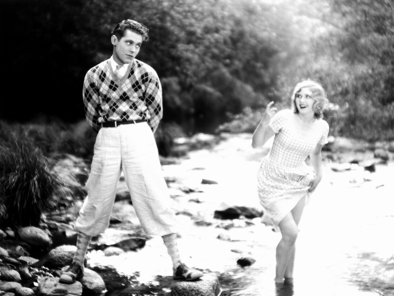 Warren Burke wears an argyle sweater and matching socks with knickerbockers in 1928's The Farmer's Daughter.