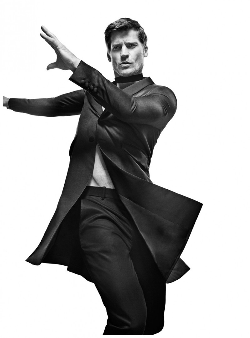 Nikolaj Coster-Waldau strikes a moving pose in a look from Italian fashion house Prada.
