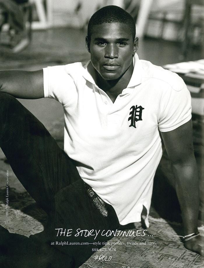 Henry Watkins poses for a classic black & white image, modeling one of Polo Ralph Lauren's essential polo shirts.