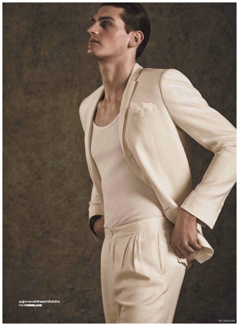 Sasha Legrand embraces the lightness of spring in a neutral colored Corneliani suit.