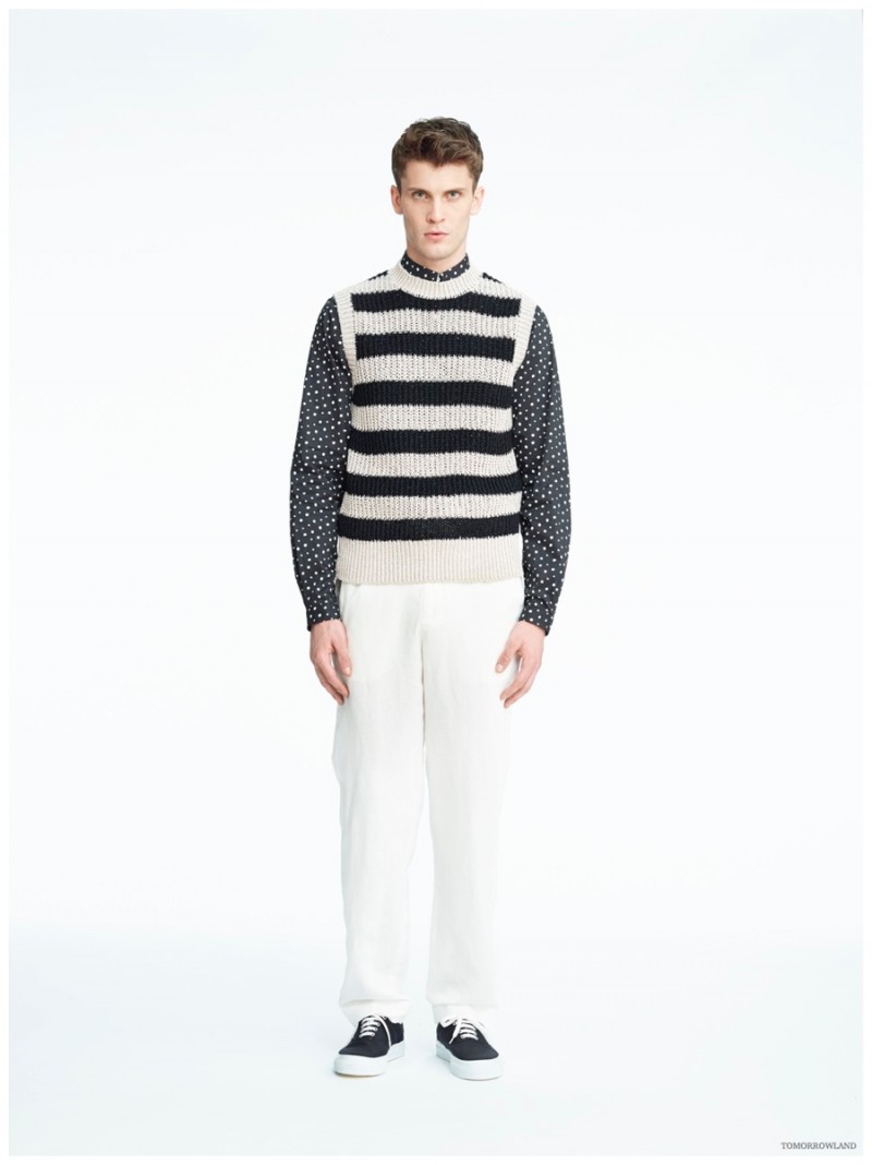 Tomorrowland revisits the sweater vest on model William Eustace with a geek chic striped approach to the season.