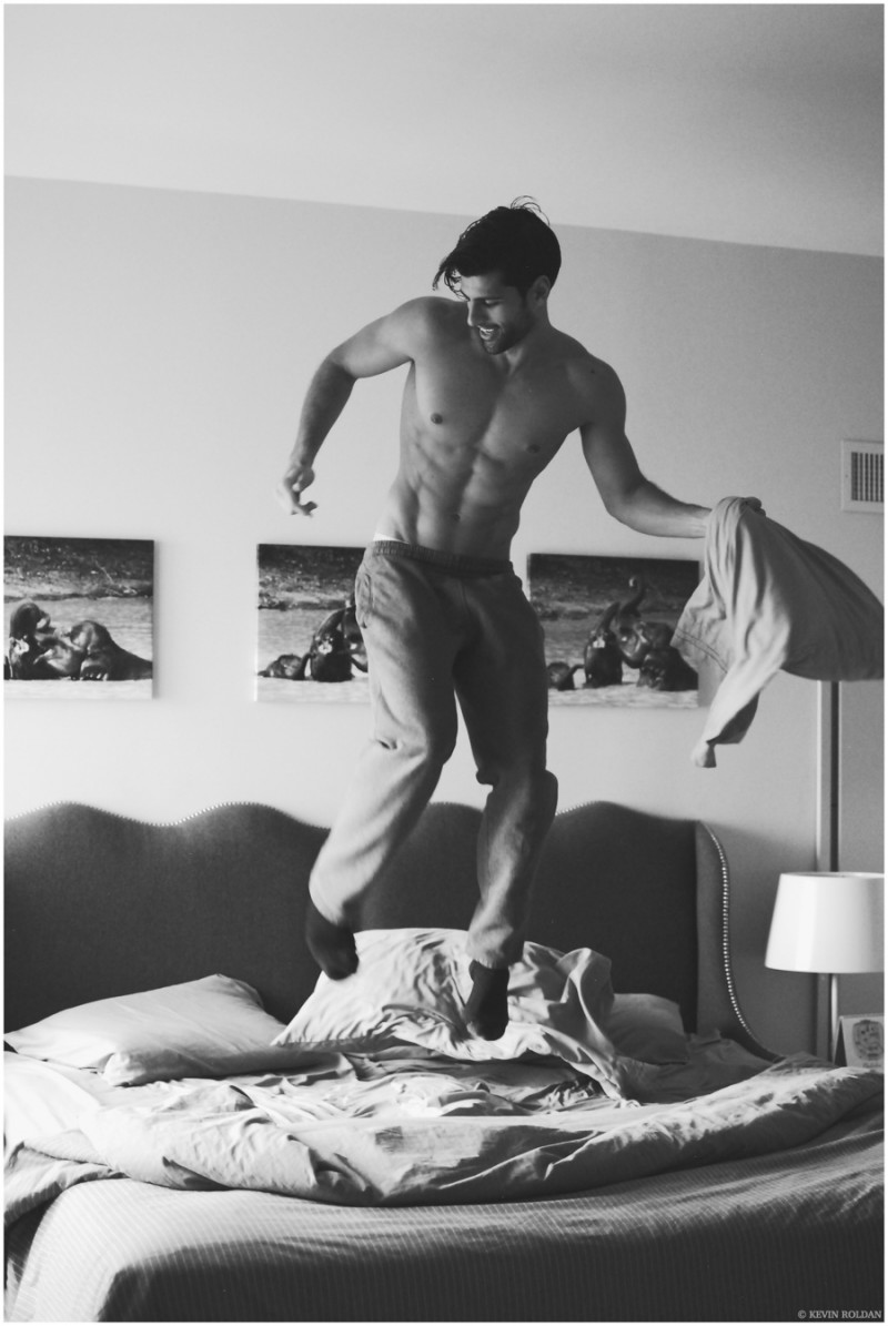 Having a moment, Adam Caldera jumps around the living room.