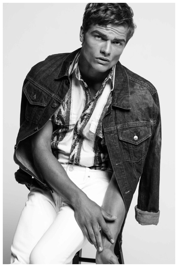 Aidan Anderson breaks up a white look with an essential denim jacket.