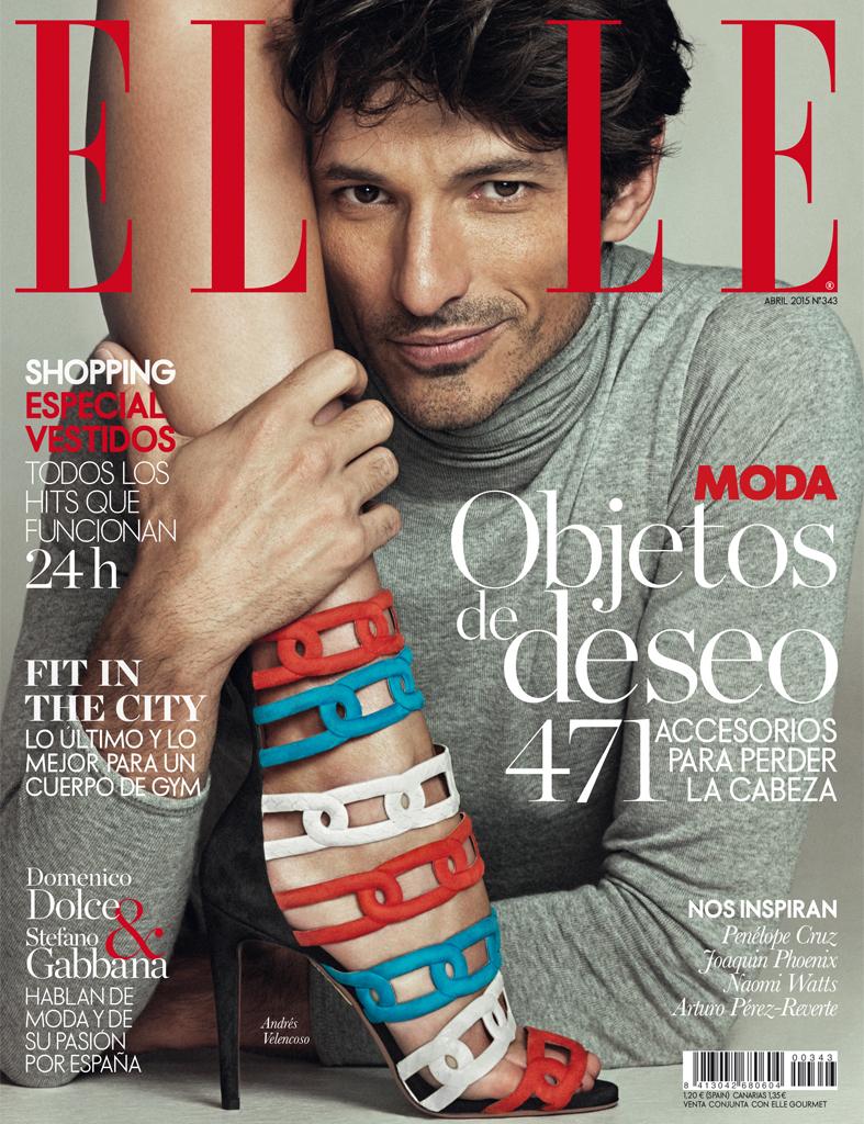 Spanish model Andres Velencoso Segura delivers a winning smirk for the April 2015 cover of Elle Spain.