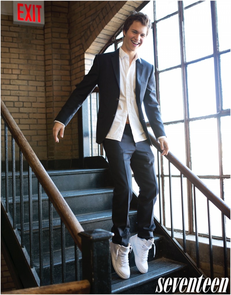 Ansel Elgort is cheeky in a slim-cut suiting look, paired with white sneakers.