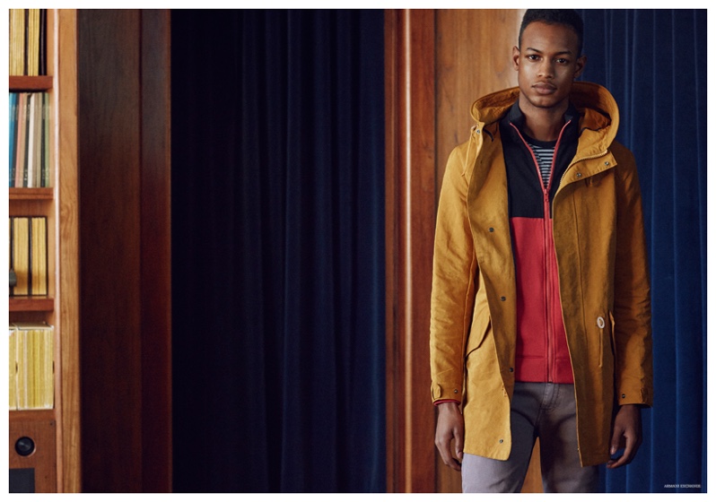 Conrad Bromfield mixes primary colors as he layers yellow and red outerwear.