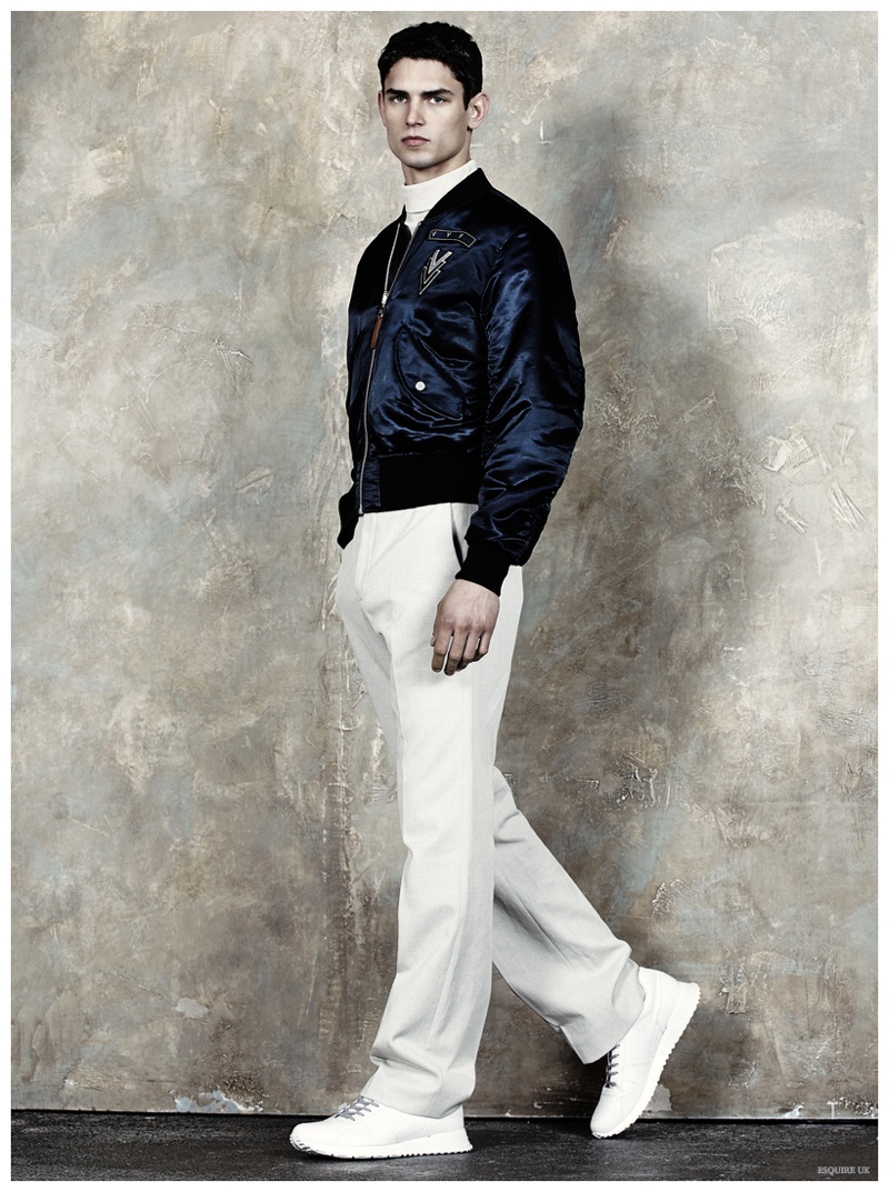 French model Arthur Gosse cozies up to Louis Vuitton in a Kim Jones design.