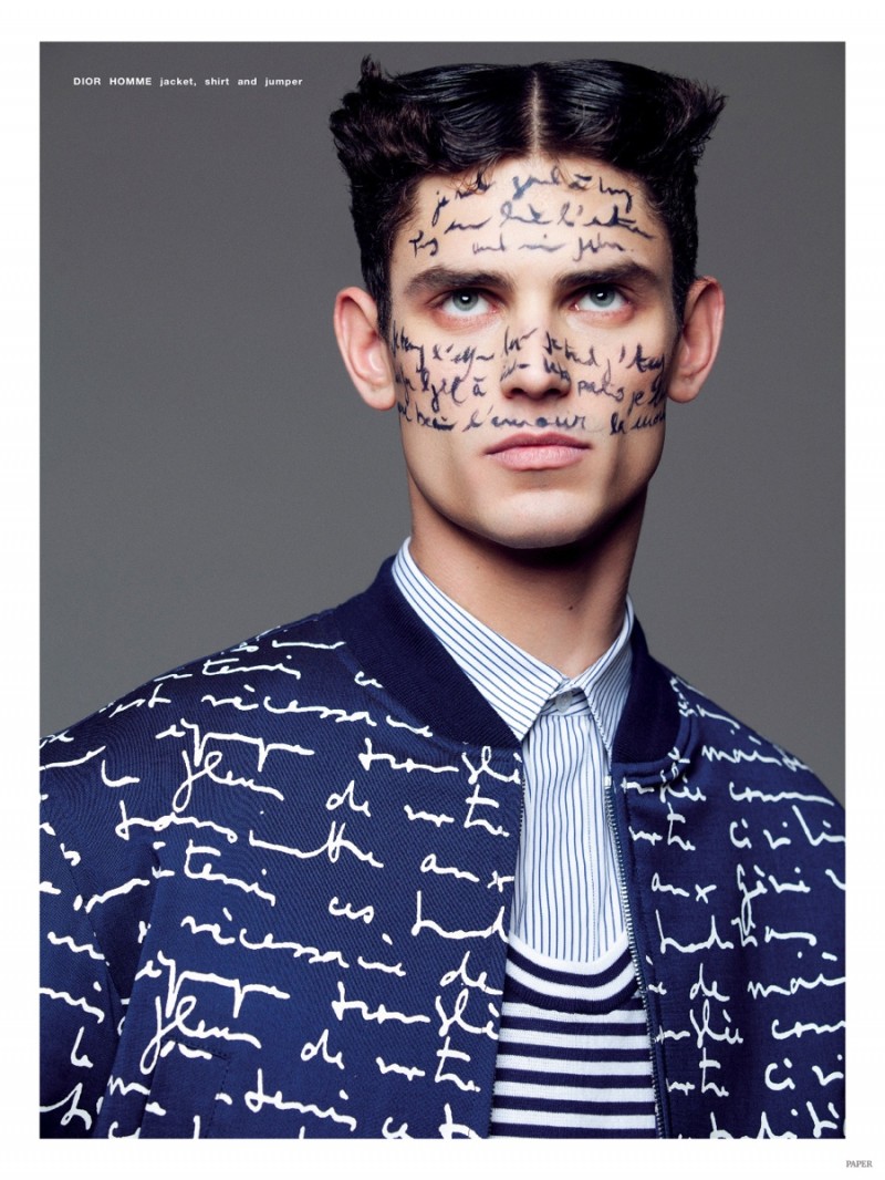 Arthur Gosse wears a blue look from Dior Homme.