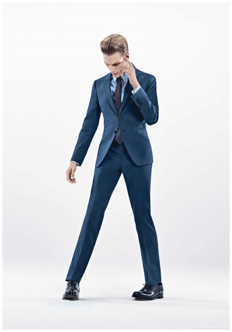 German model Paul Boche hits a sharp pose in the lean lines of Paul Smith.