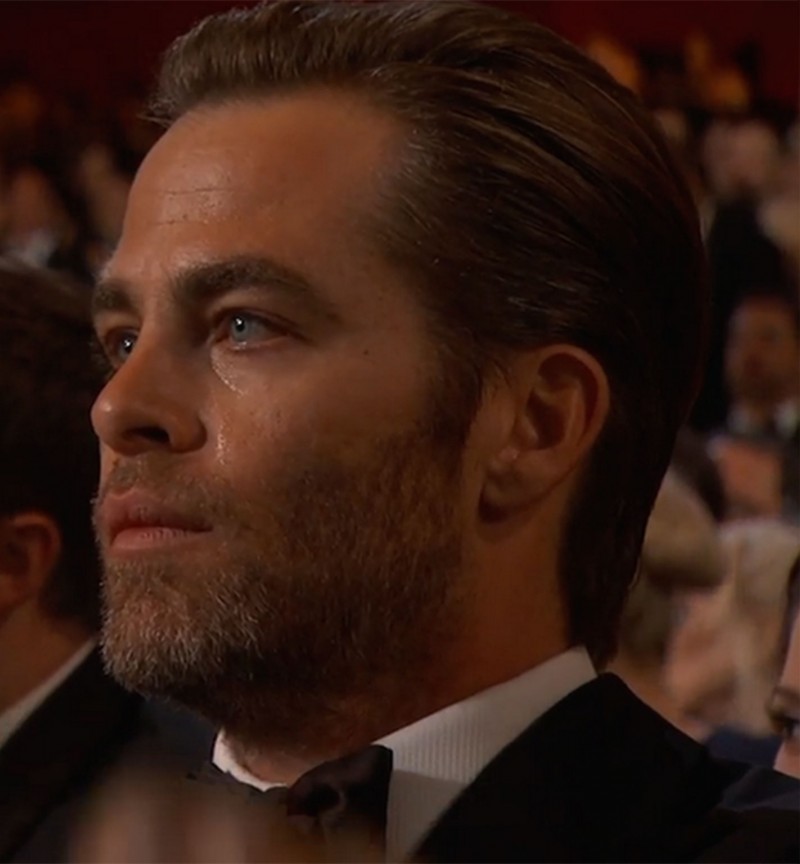 Chris Pine cries during John Legend and Common's Oscars performance.