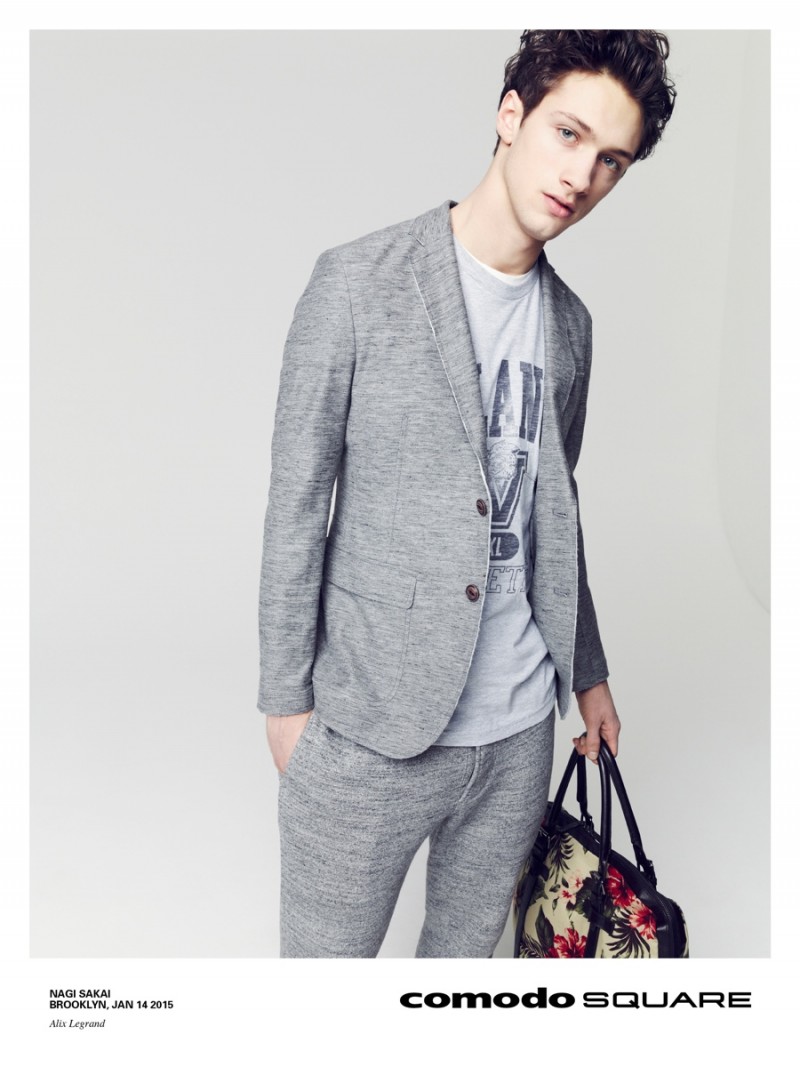 Model Alix Legrand is a sophisticated vision of leisure in an unstructured marle gray suiting look.