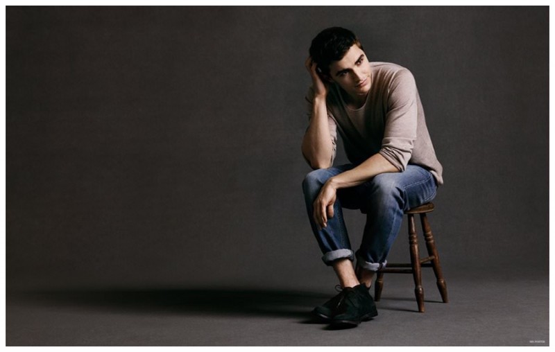 Dave Franco wears sweater Loewe, denim jeans Marc by Marc Jacobs and desert boots Officine Creative.
