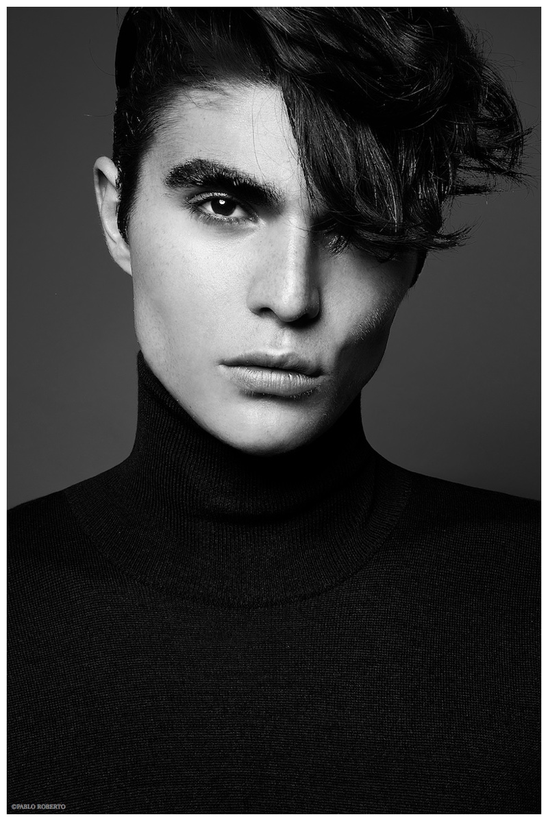 Sleek Classics: Diego Villarreal models an essential black turtleneck.