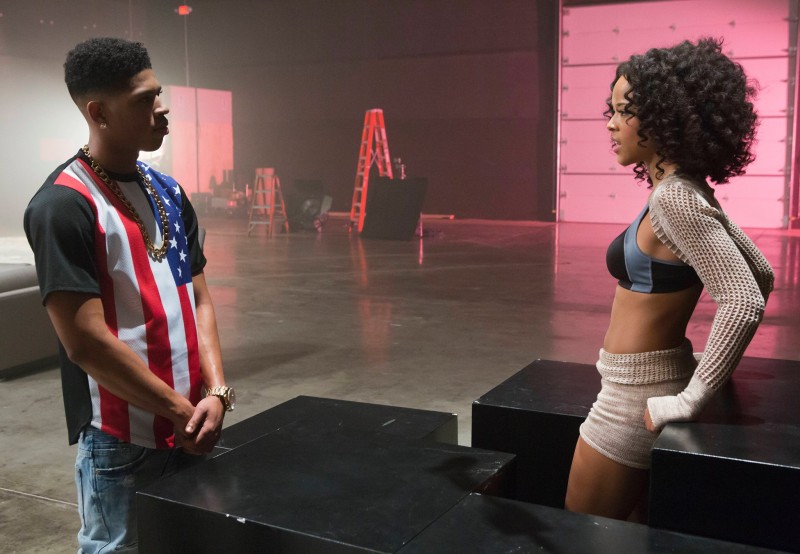 Jamal Lyon shows his patriotism in a graphic American flag print t-shirt.