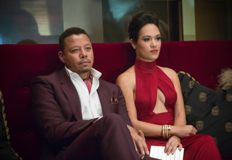 Sporting a burgundy suit, Lucious Lyon is captured with Anika.