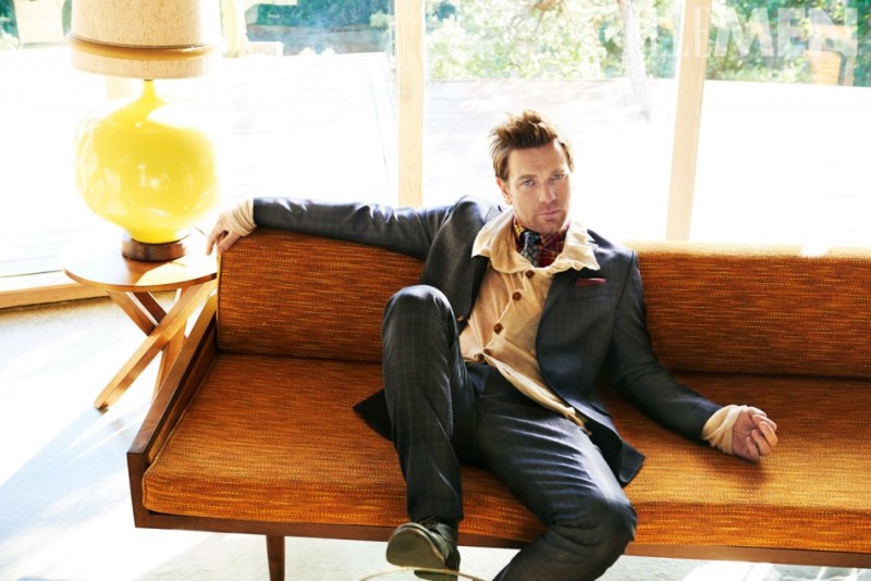 Relaxing indoors, Ewan McGregor layers with a cheeky knit.