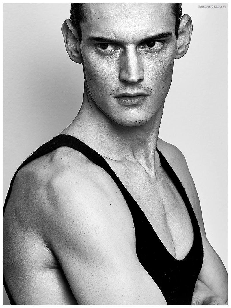 Adam Butcher wears tank Isabel Beneato.