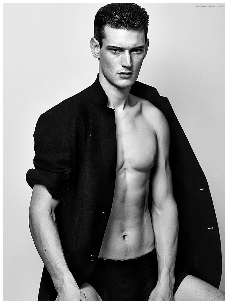 Adam Butcher wears blazer UNIQLO and underwear Calvin Klein.