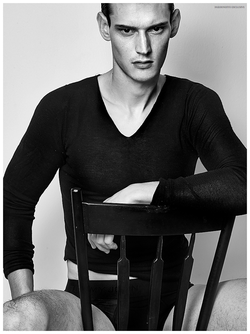 Adam Butcher wears shirt Dolce & Gabbana, underwear Tommy John and boots H&M.