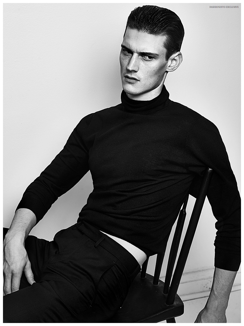 Adam Butcher wears turtleneck Givenchy by Riccardo Tisci and pants Burberry Prorsum.