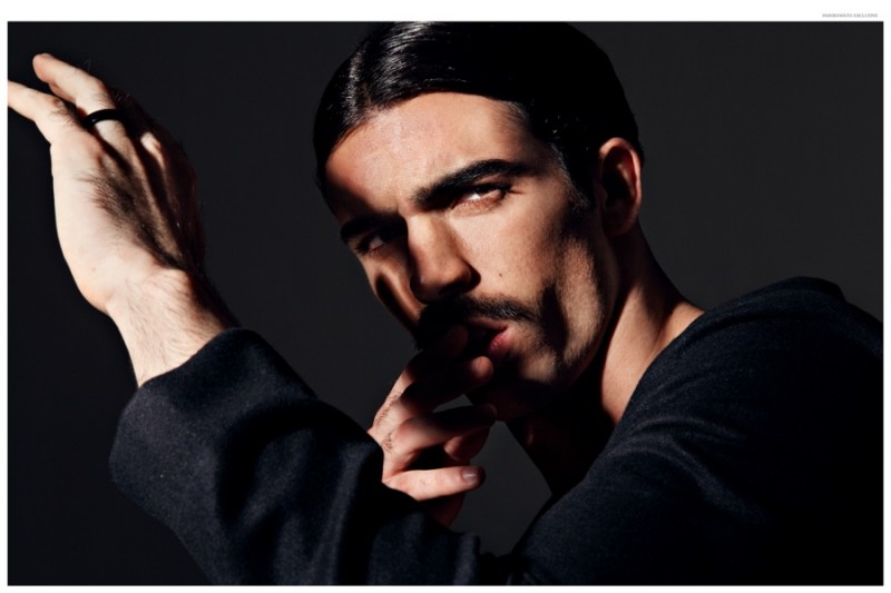 Shadowplay: Carlos Sanjuan sports a sleek center part.