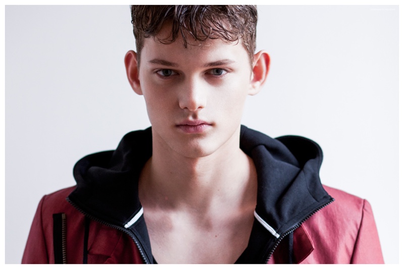 Christopher wears hooded jacket NIKE and red jacket Mads Dinesen.