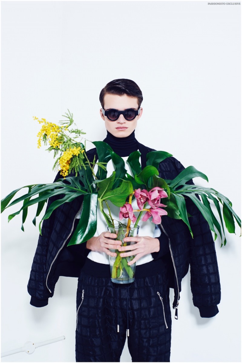 Reece wears sunglasses Black Eyewear, tee and turtleneck Topman, trousers and quilted jacket Hardware.