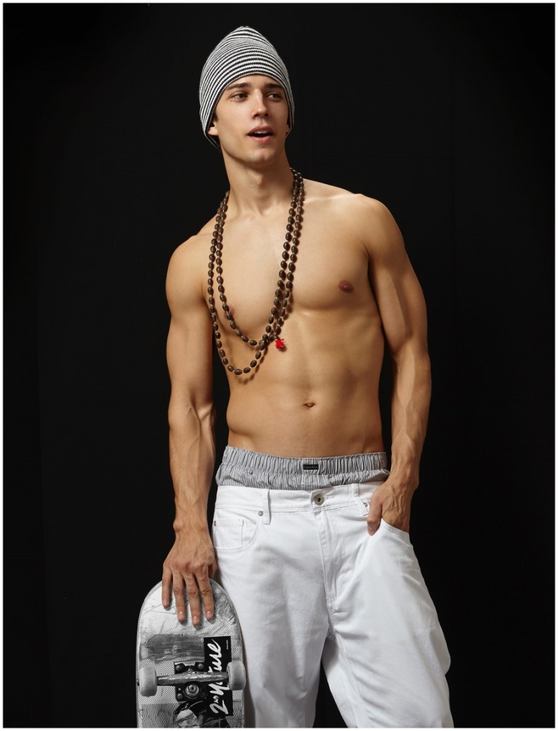 Ben Bowers wears jeans Levi's, boxers Calvin Klein, beanie Stussy and necklace stylist's own.