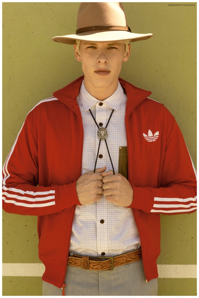 August wears zip up jacket Adidas, shirt Junya Watanabe from Modern Appealing Clothing SF, pants J.Crew, vintage belt stylist's own, hat Urban Outfitters and bolo tie from Wastelands SF.