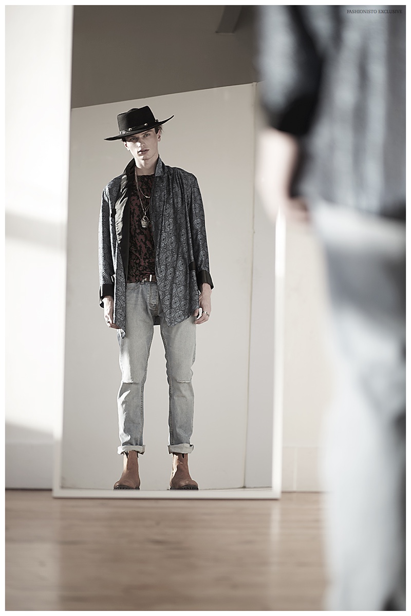 Freeman wears vintage hat and smoking jacket stylist's own, t-shirt Marc by Marc Jacobs, jeans Patrik Ervell, boots Billy Reid and vintage jewelry stylist's own.