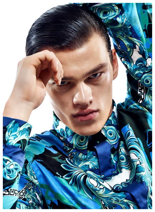 Filip Hrivnak delivers a striking close-up in a Versace shirt.