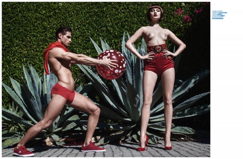 Sahib is pool-ready in a red swimsuit and sneakers.