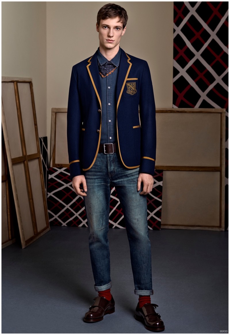 Enlist for the Gucci school of style with a sharp jacket featuring piping and a crest. 