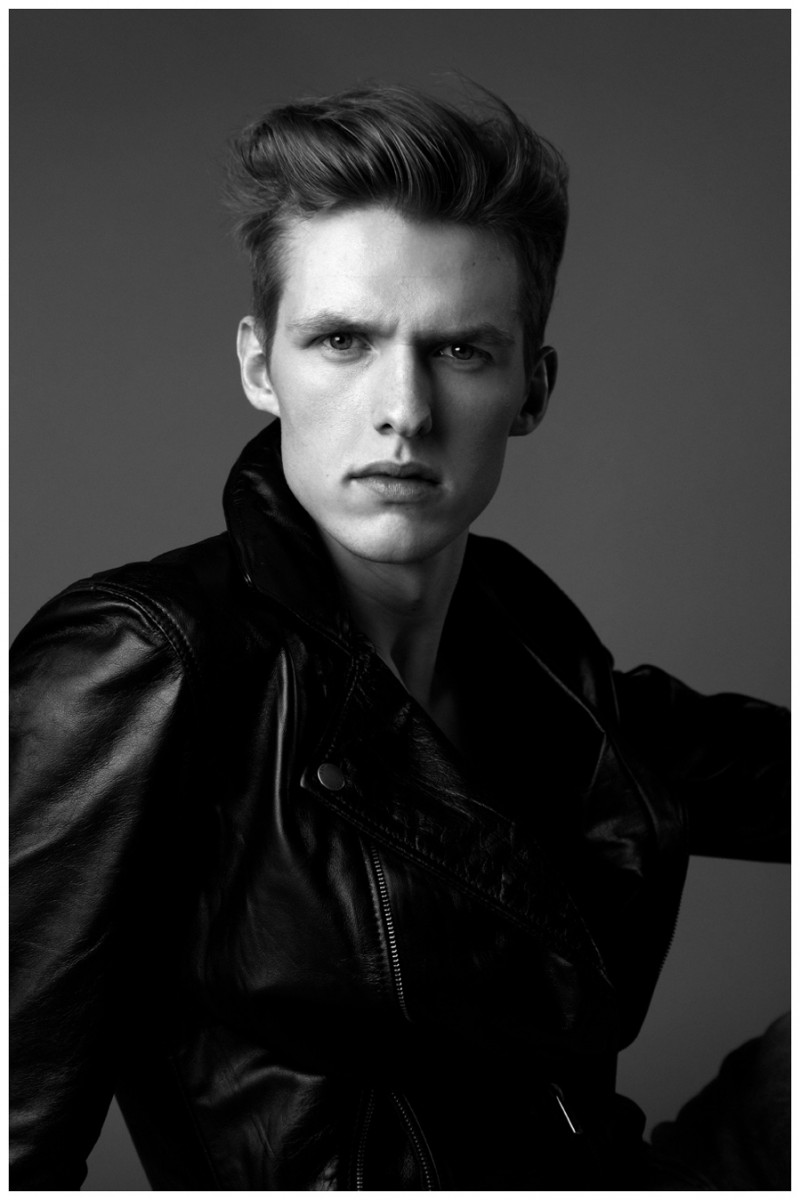 Jacob Okrasa delivers a striking close-up in a trendy leather jacket.