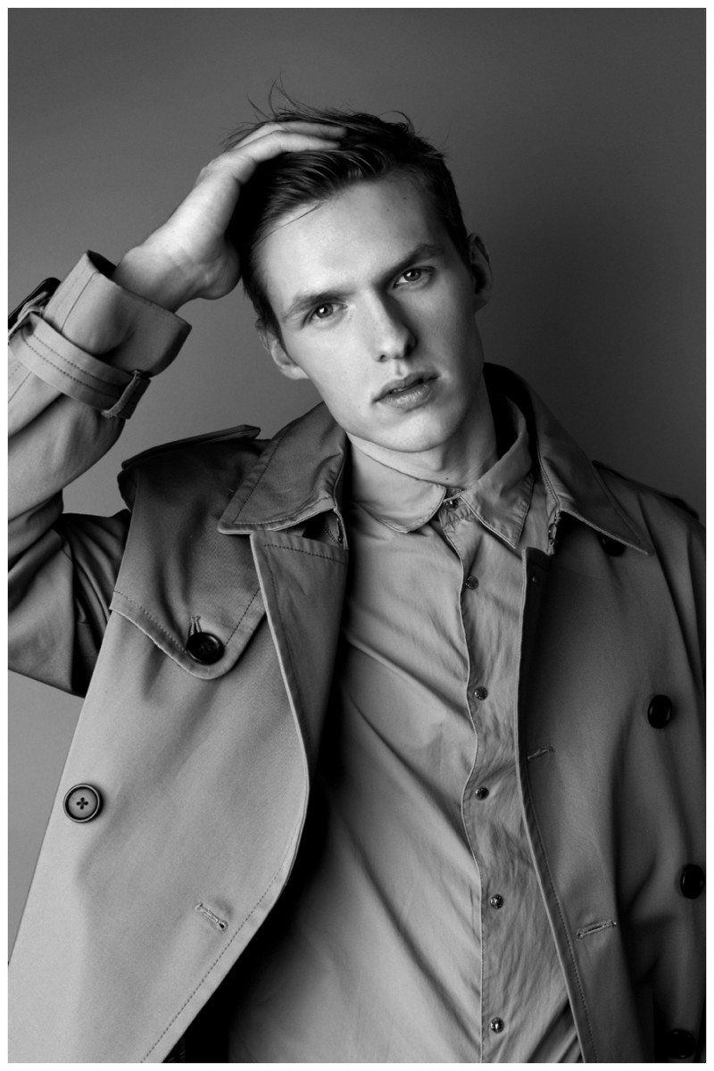 Jacob Okrasa sports a timeless trench coat.