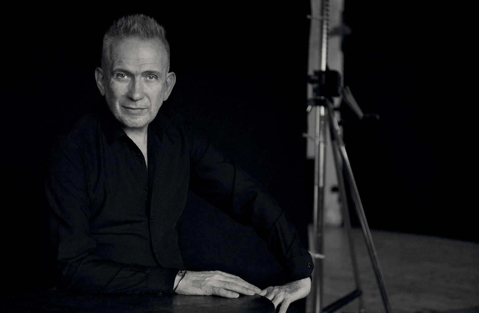 Jean Paul Gaultier, a French fashion designer, poses for a photo