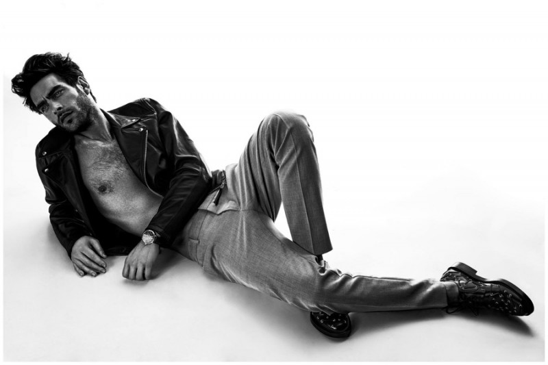 Jon Kortajarena goes shirtless in a leather jacket.