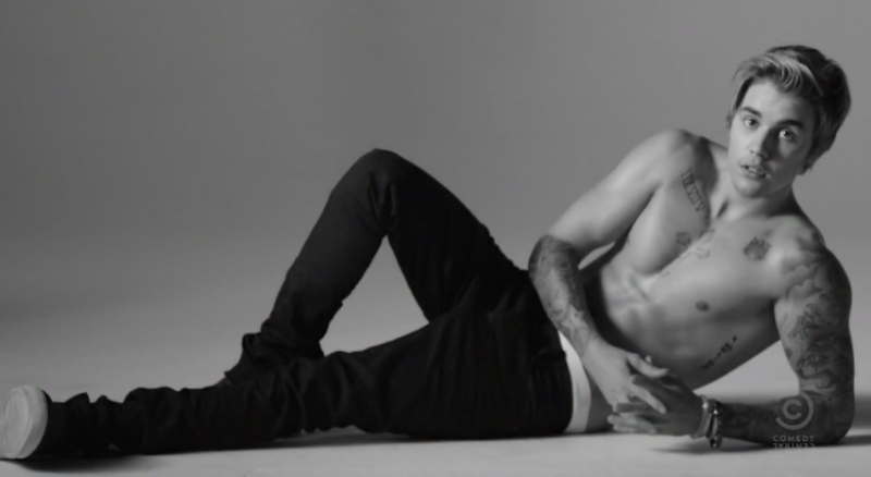 Justin Bieber spoofs his Calvin Klein advertisements for a new Comedy Central spot promoting his upcoming roast. 