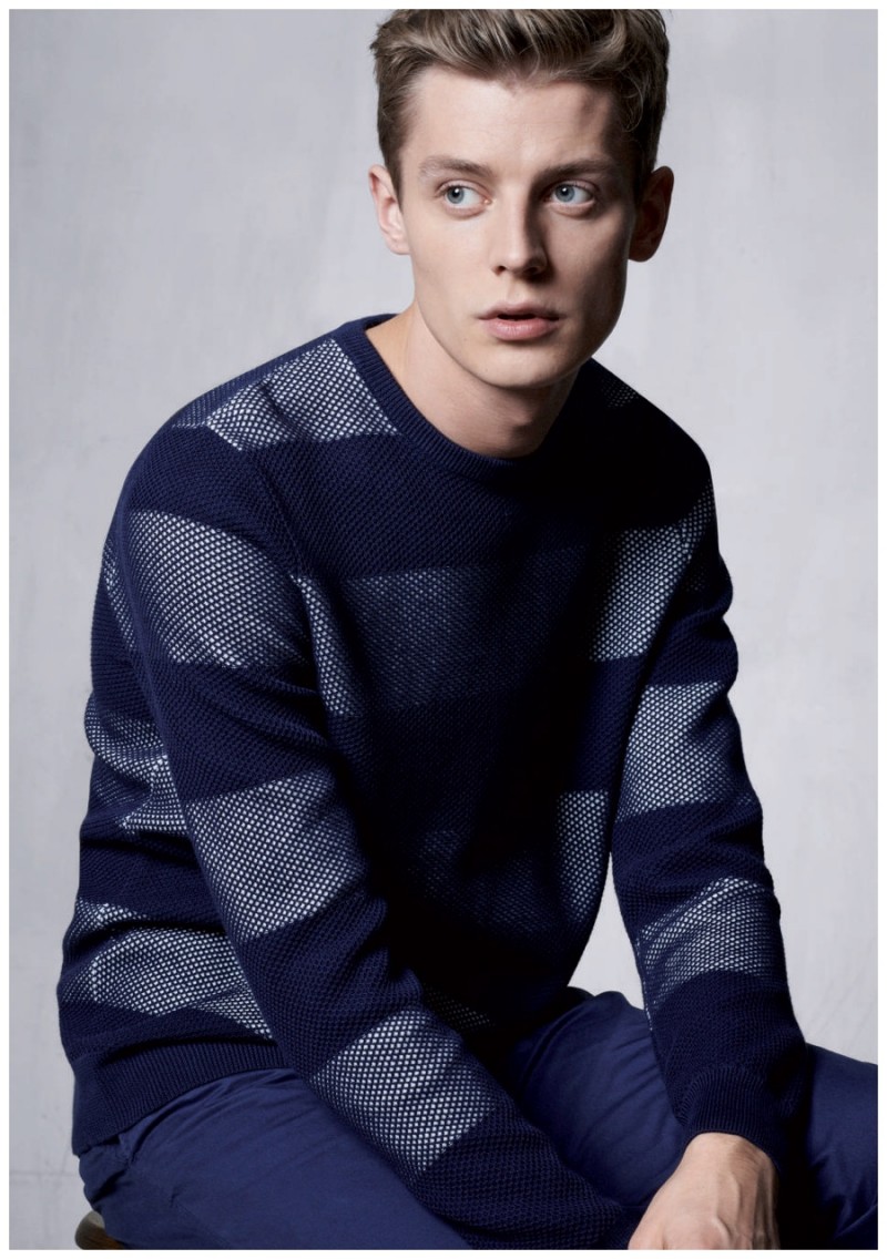 Janis Ancens models a navy look from Lacoste's fall-winter 2015 menswear collection.
