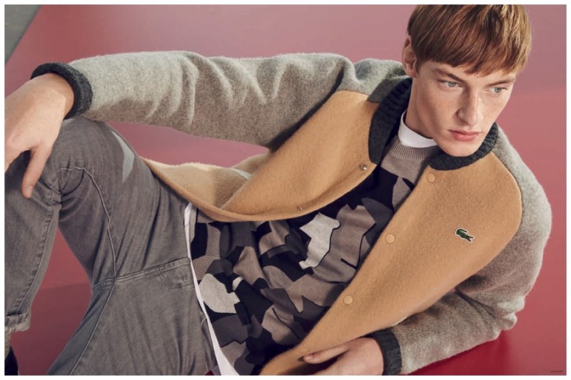 Roberto Sipos goes sporty in a colorblock bomber jacket from Lacoste L!ve.