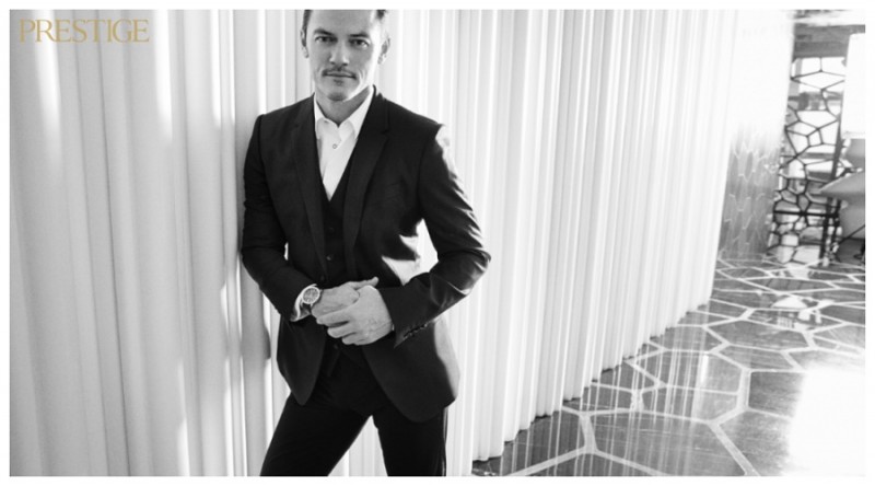 Luke Evans wears suit Dolce & Gabbana and shirt Givenchy by Riccardo Tisci.