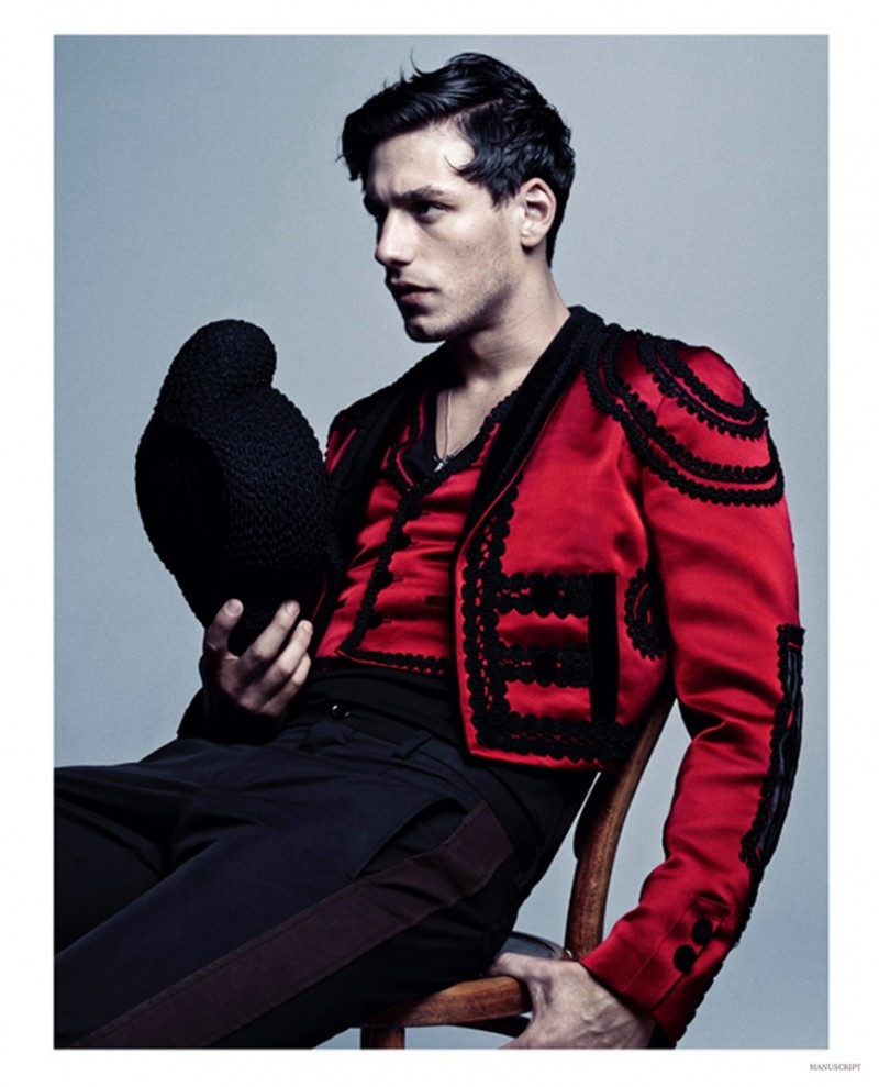 Mariano Ontañon models a red and black bullfighter-inspired look from Dolce & Gabbana.