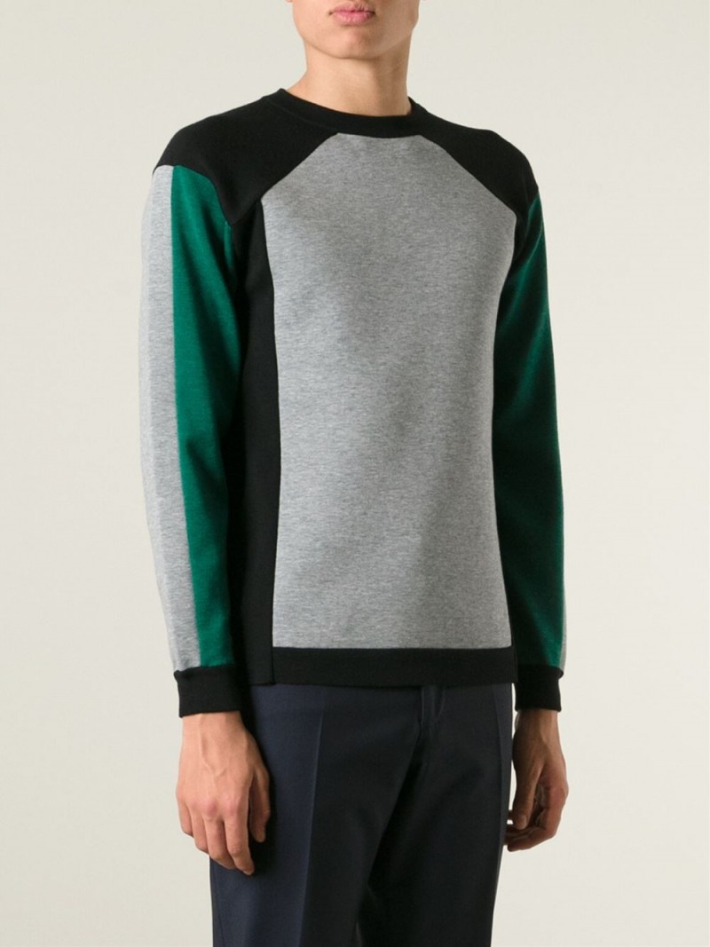 Looking to replicate Eddie Redmayne's smart look? Try a color block sweater from Italian label Marni.