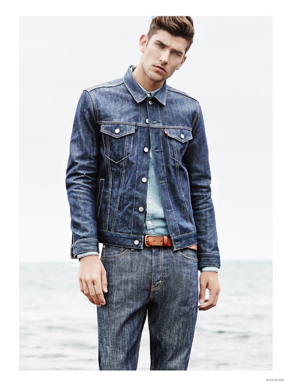 How to Wear Denim on Denim: Model Jack Vanderhart triples up on denim for a look that combines various washes for a denim jacket worn over a shirt with denim jeans.