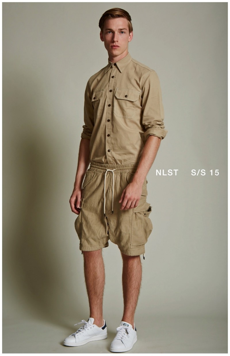 A monochromatic vision, David Hlinka is the image of casual in a button-down and elastic waistband shorts.