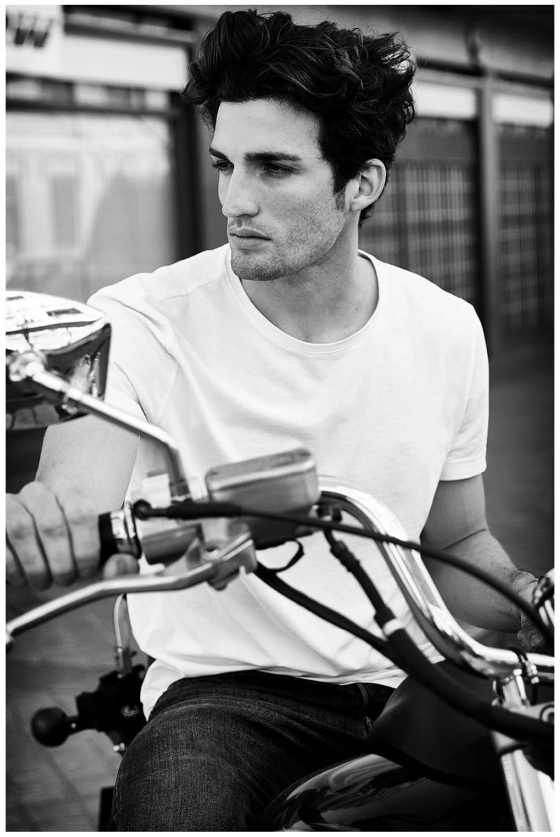 Riding a bike, Nahuel Casares wears t-shirt Calvin Klein and jeans American Apparel.