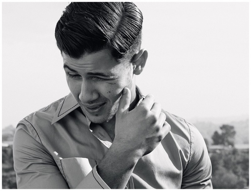 Nick Jonas is caught off guard for a black & white photo.
