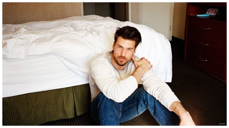 Nick Zano wears sweater Bottega Veneta and jeans Levi's Vintage Clothing.