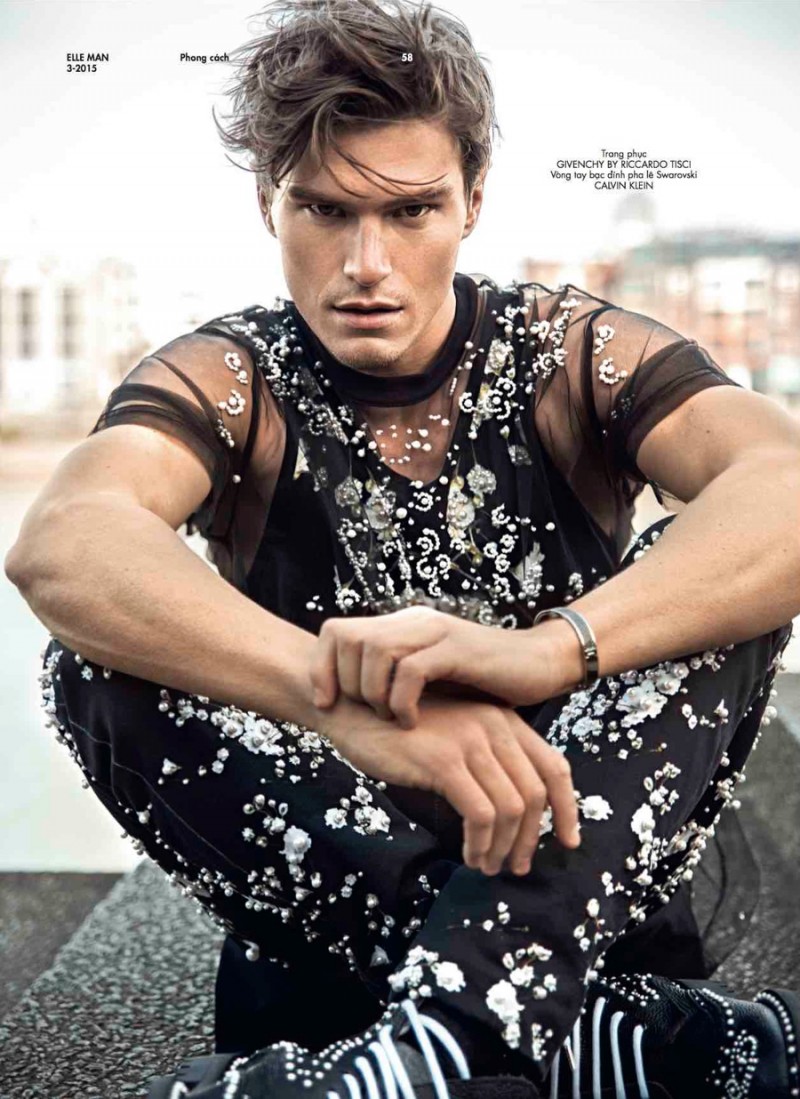 Oliver Cheshire embraces a bold printed look from Givenchy.