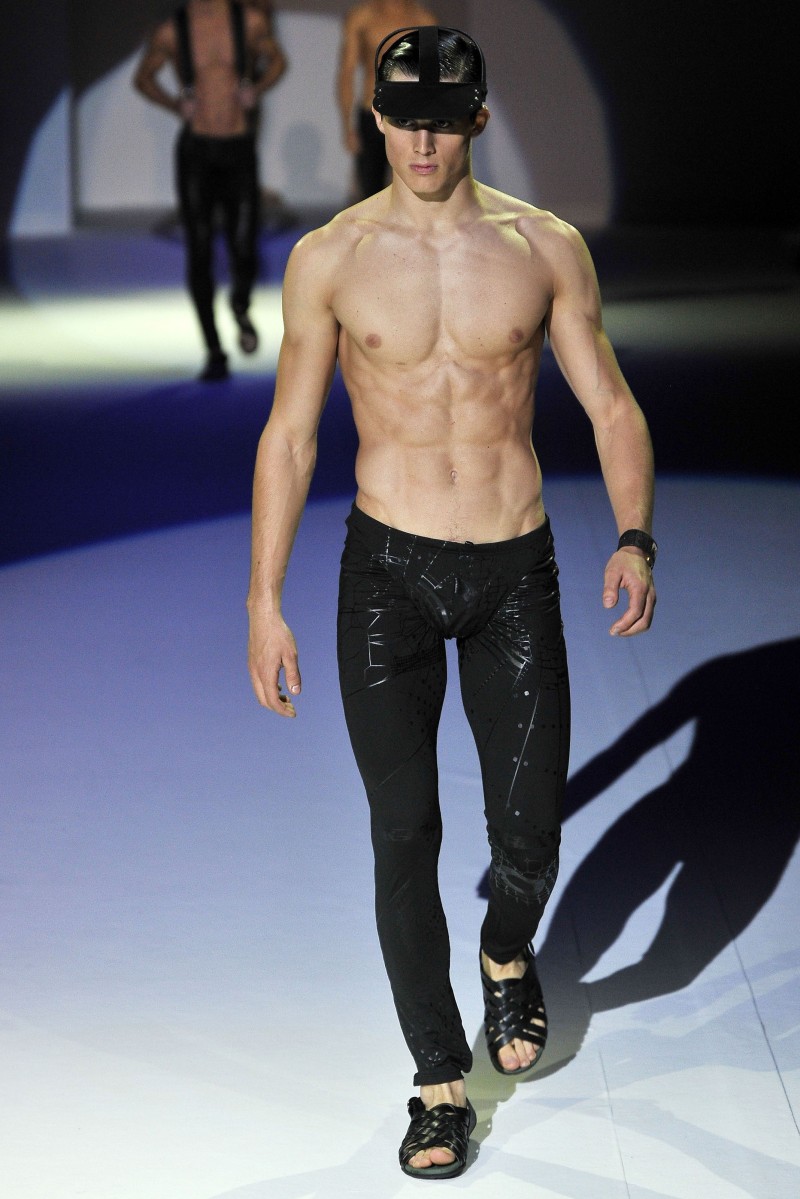 A shirtless Pietro Boselli hits the catwalk for Emporio Armani's spring-summer 2011 men's show.